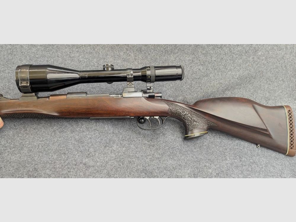 Mauser Mod 98 with animal engraving and stalking safety
