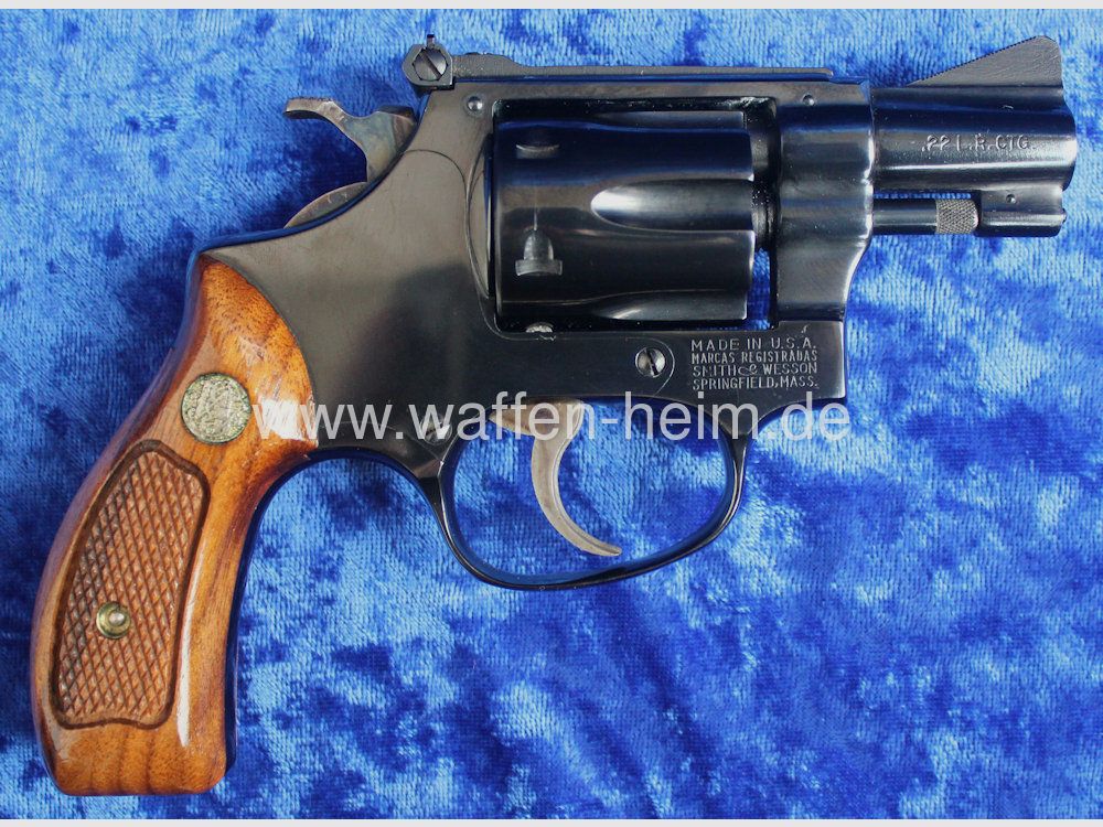 Smith & Wesson	 34 - 1 / 2"