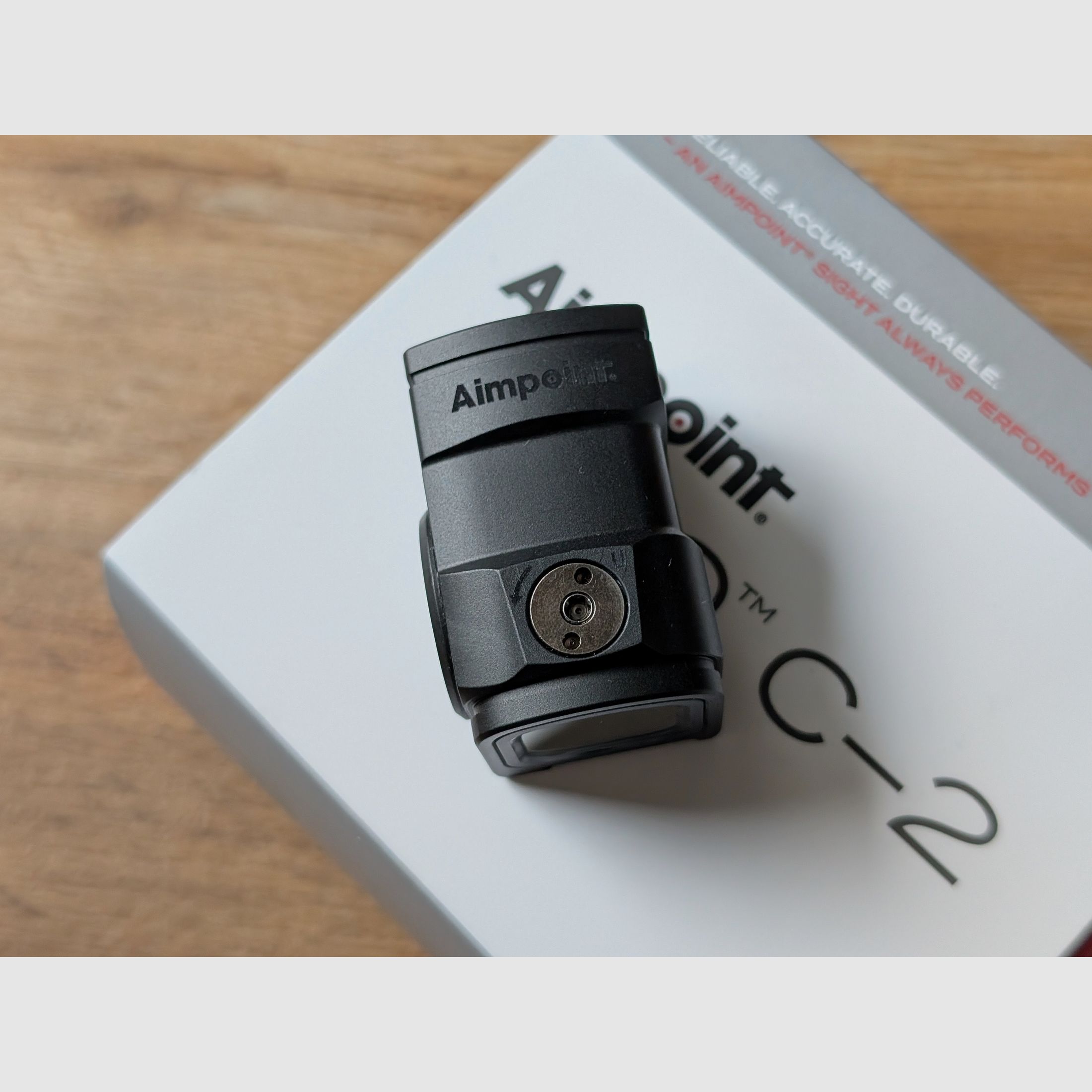 Two months old Aimpoint ACRO C-2 with receipt