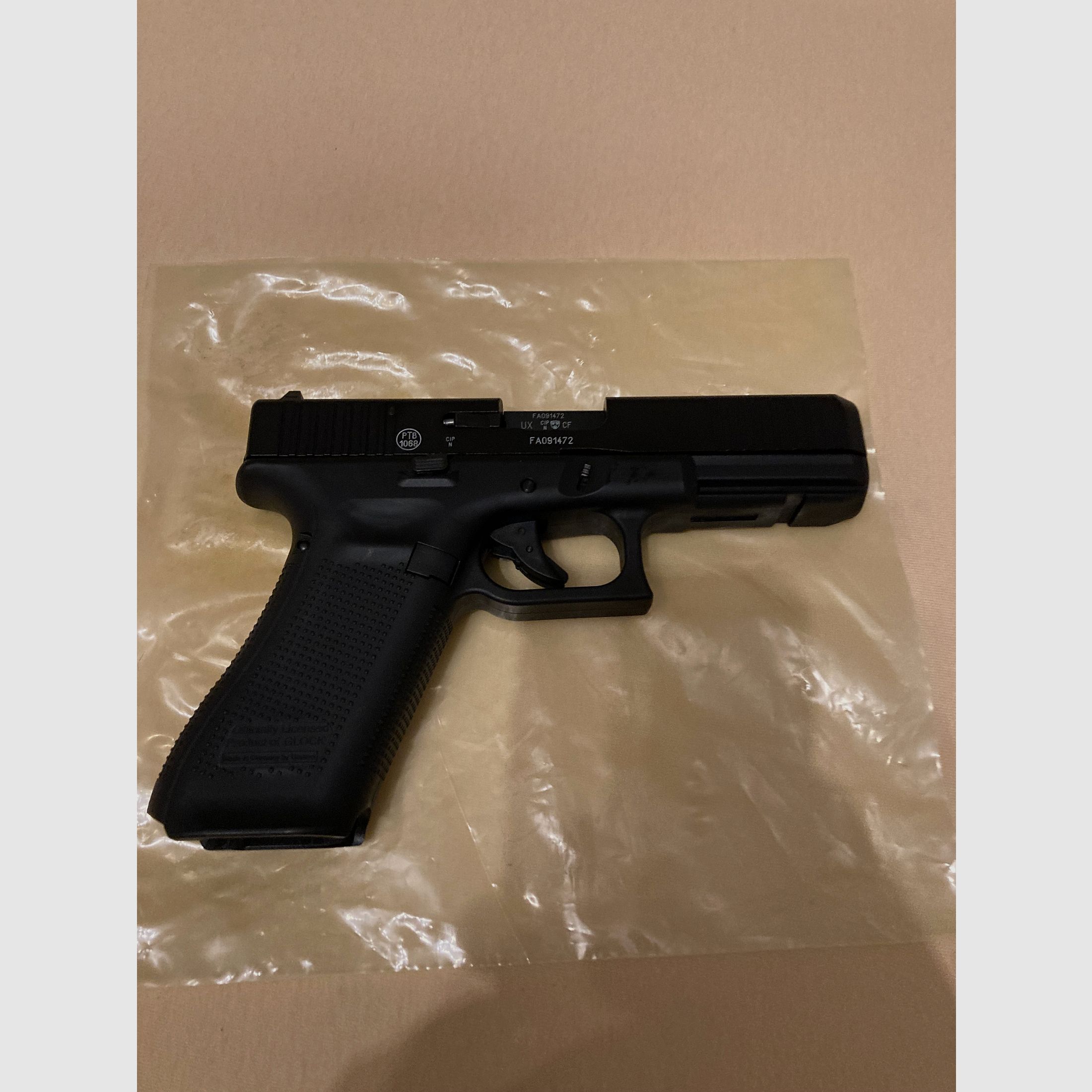 Glock 17 Gen5 with two magazines and holster