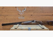 Caesar Guerini - Invictus I Sporting 81cm 12/76 incl. cartuchos de compensación y BoreSnake