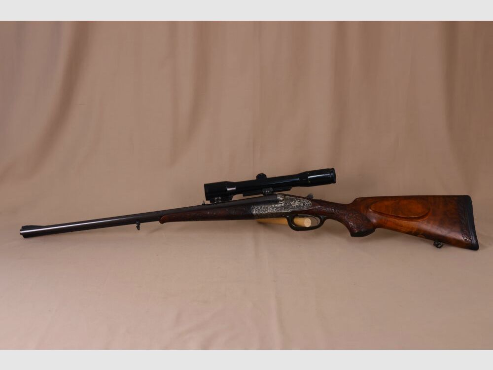 Ten FFM double rifle // Exclusive // Ejector! // Great engraving and walnut wood!!