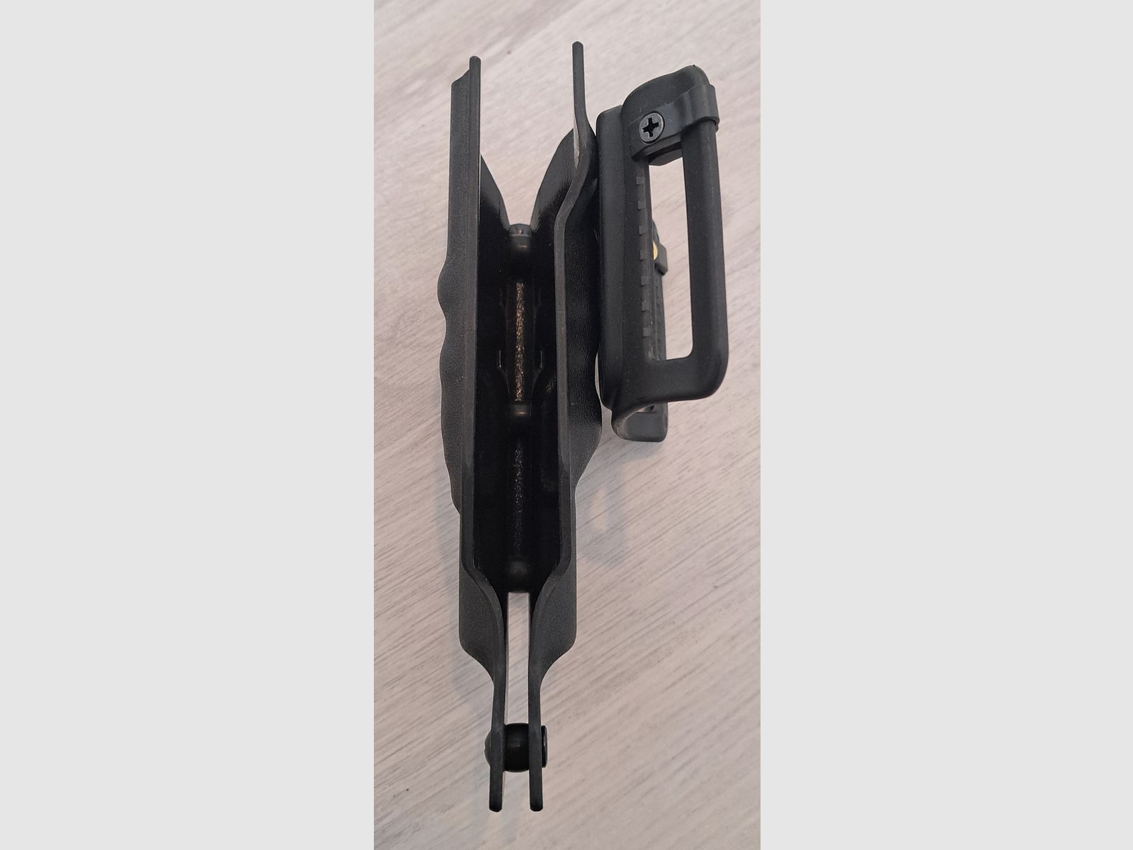 Glock belt holster compatible with suppressors and flashlights