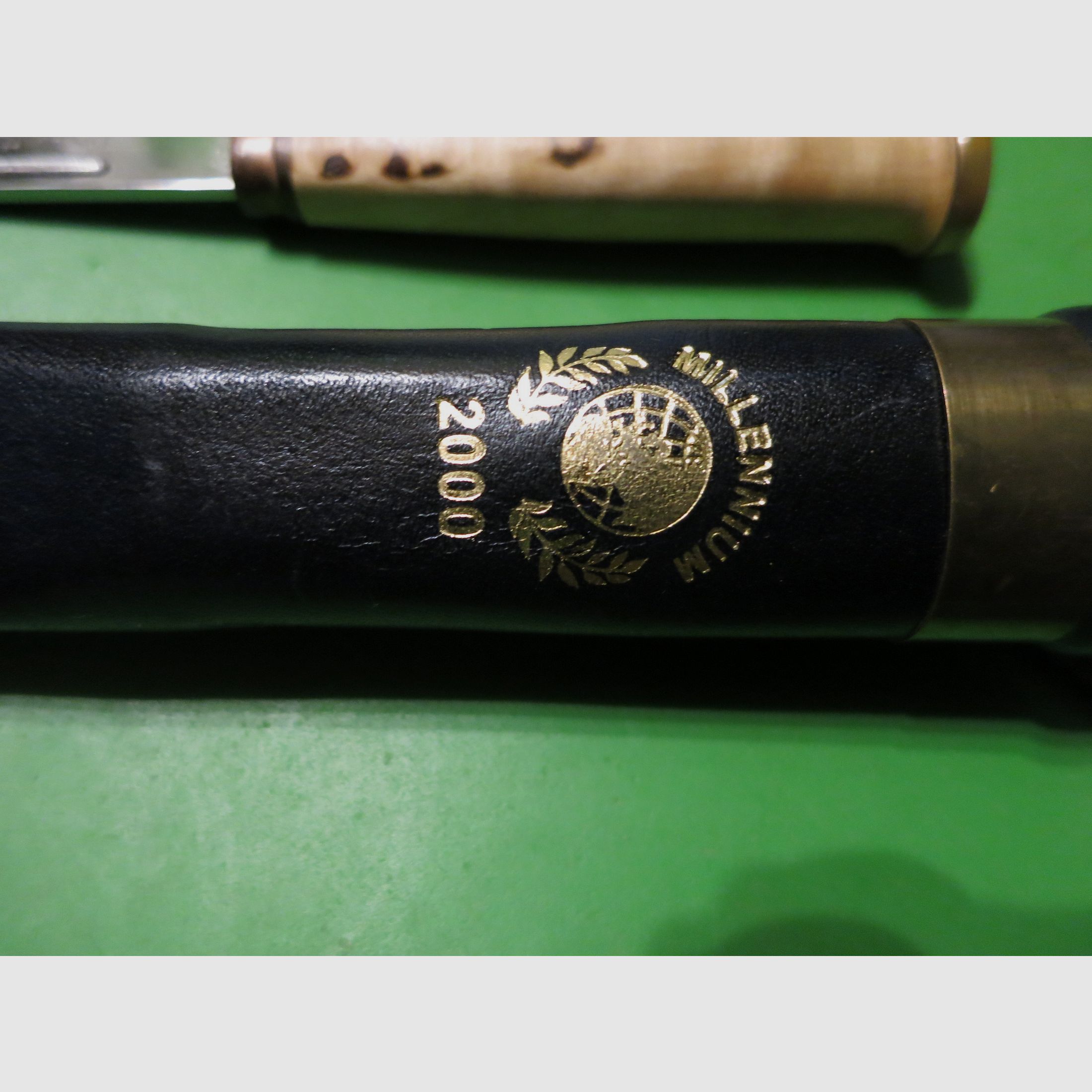 Marttiini herdenkingsmillennium “2000”, jachtmes in Lapse stijl, jaarmes-