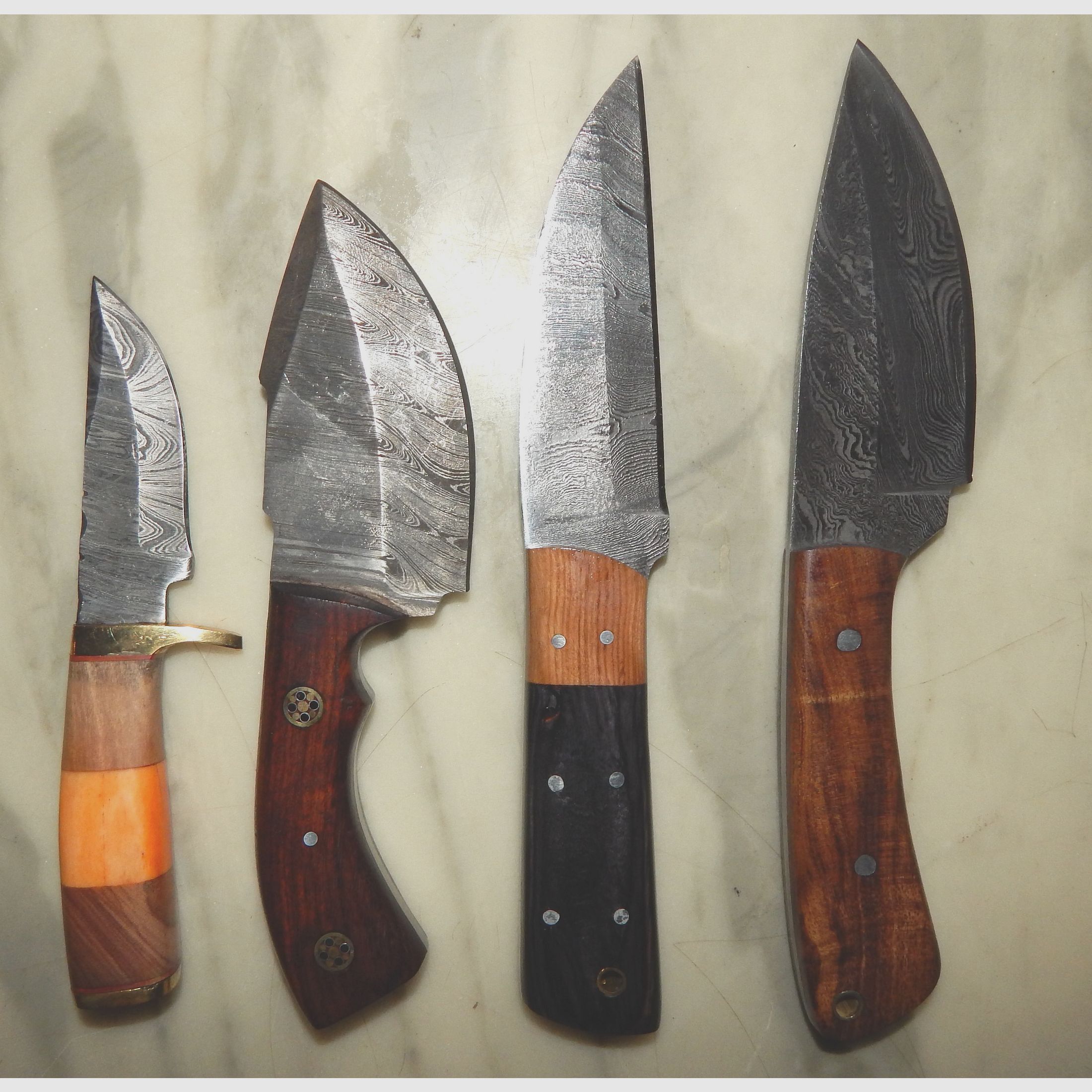 Coltelli da caccia, coltelli da viaggio, coltelli da cucina / acciaio damascato