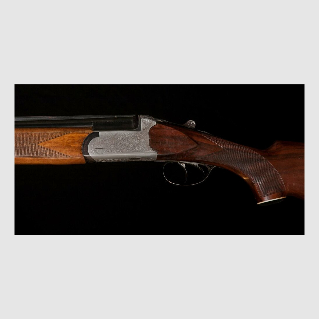 Double-barreled shotgun with ejector