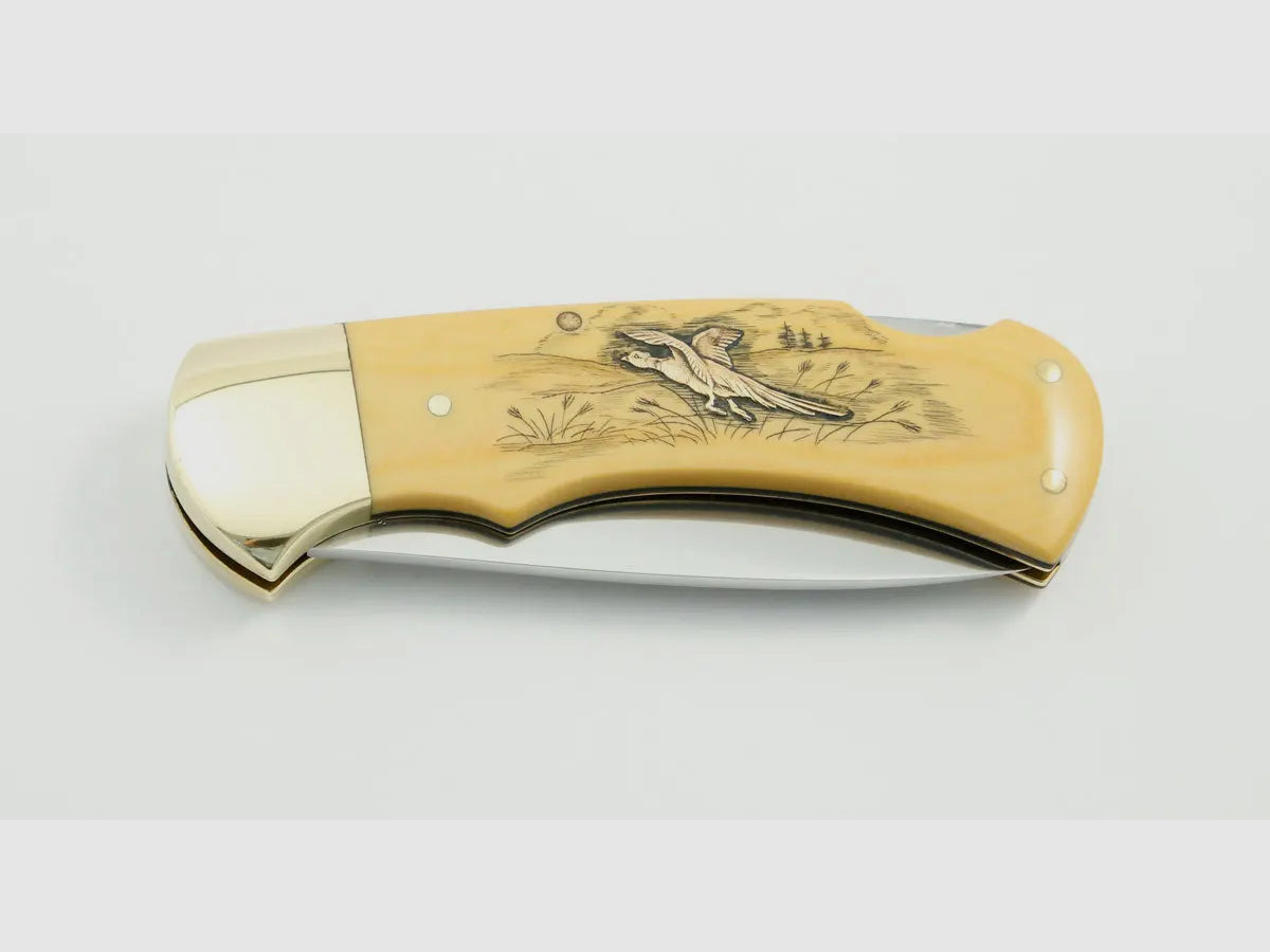 (Rarities) Puma 4-Star 715 with brass inlays duck and pheasant, warranty card, 1983