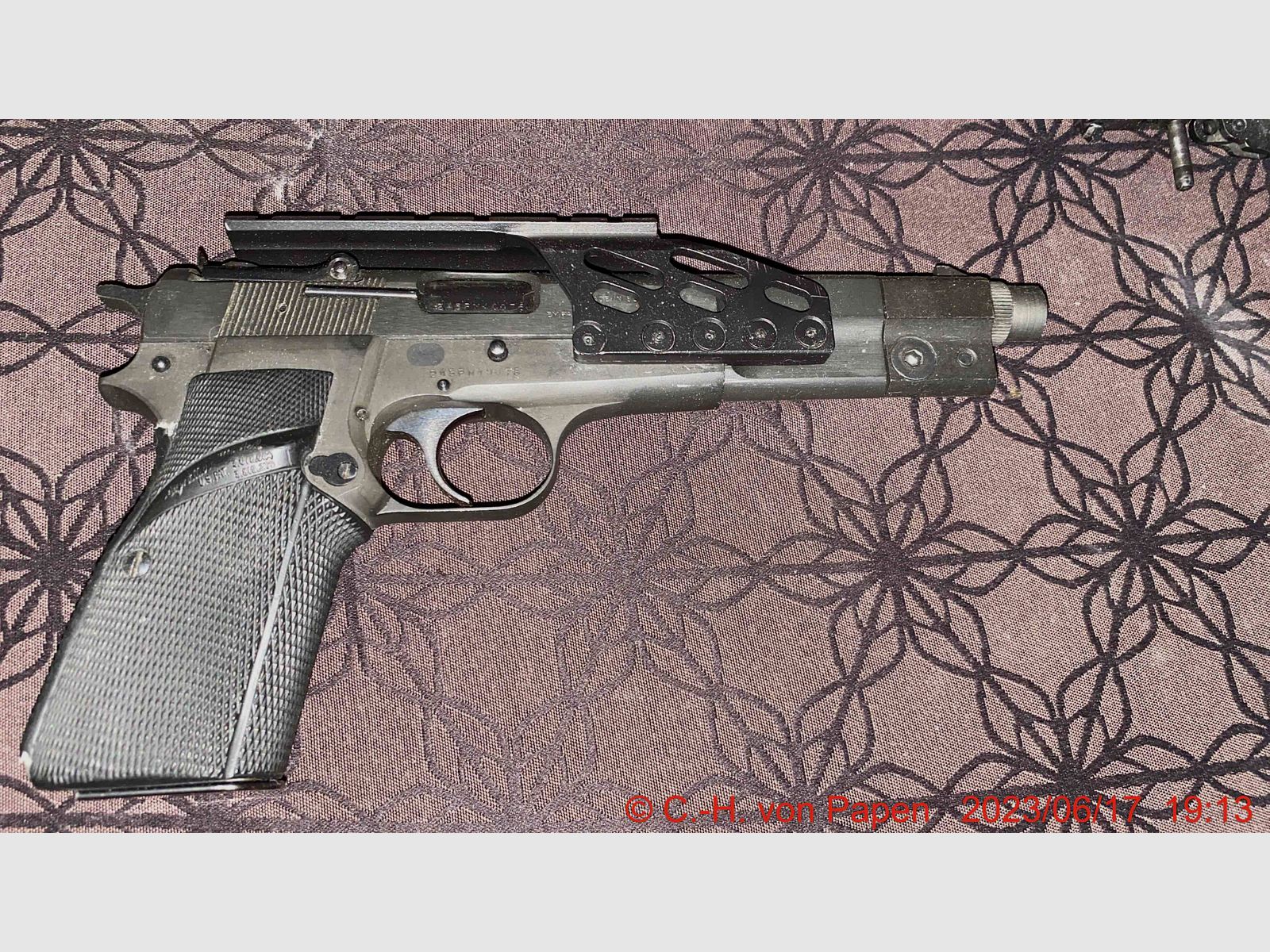 Browning FN HP Competition pistol with 6" barrel caliber 9mm Luger & spare magazine 17 rounds