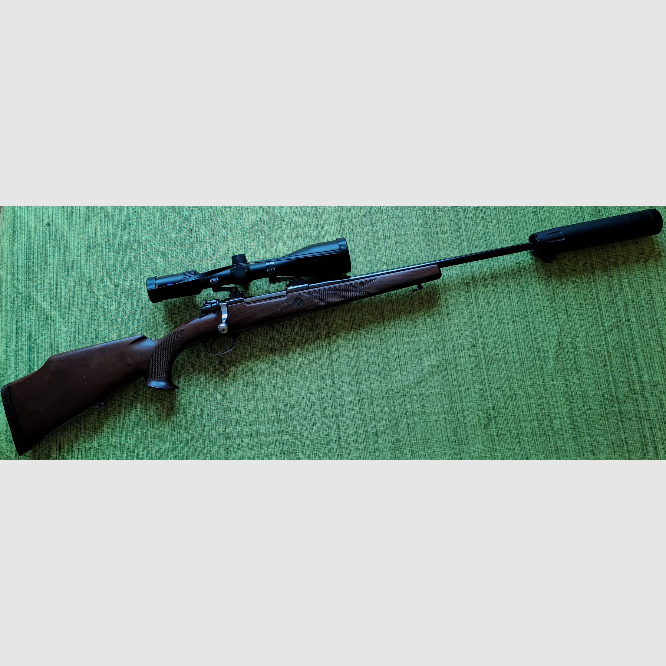 Repetierbüchse System Mauser 98 w kal. 30-06 z Zeiss Conquest V4 3-12x56 i tłumikiem Atec H2