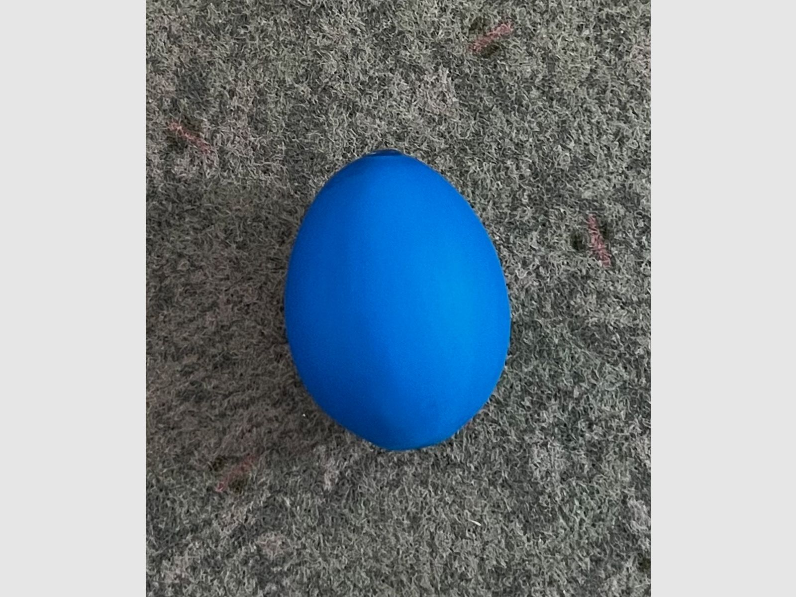 UV-blau fluoreszierendes Lockei Huhn