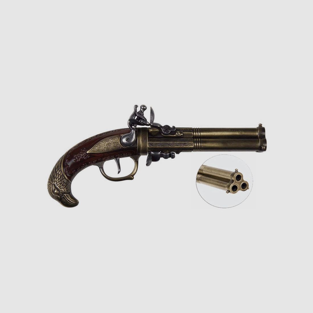Three-barreled flintlock pistol and eagle head