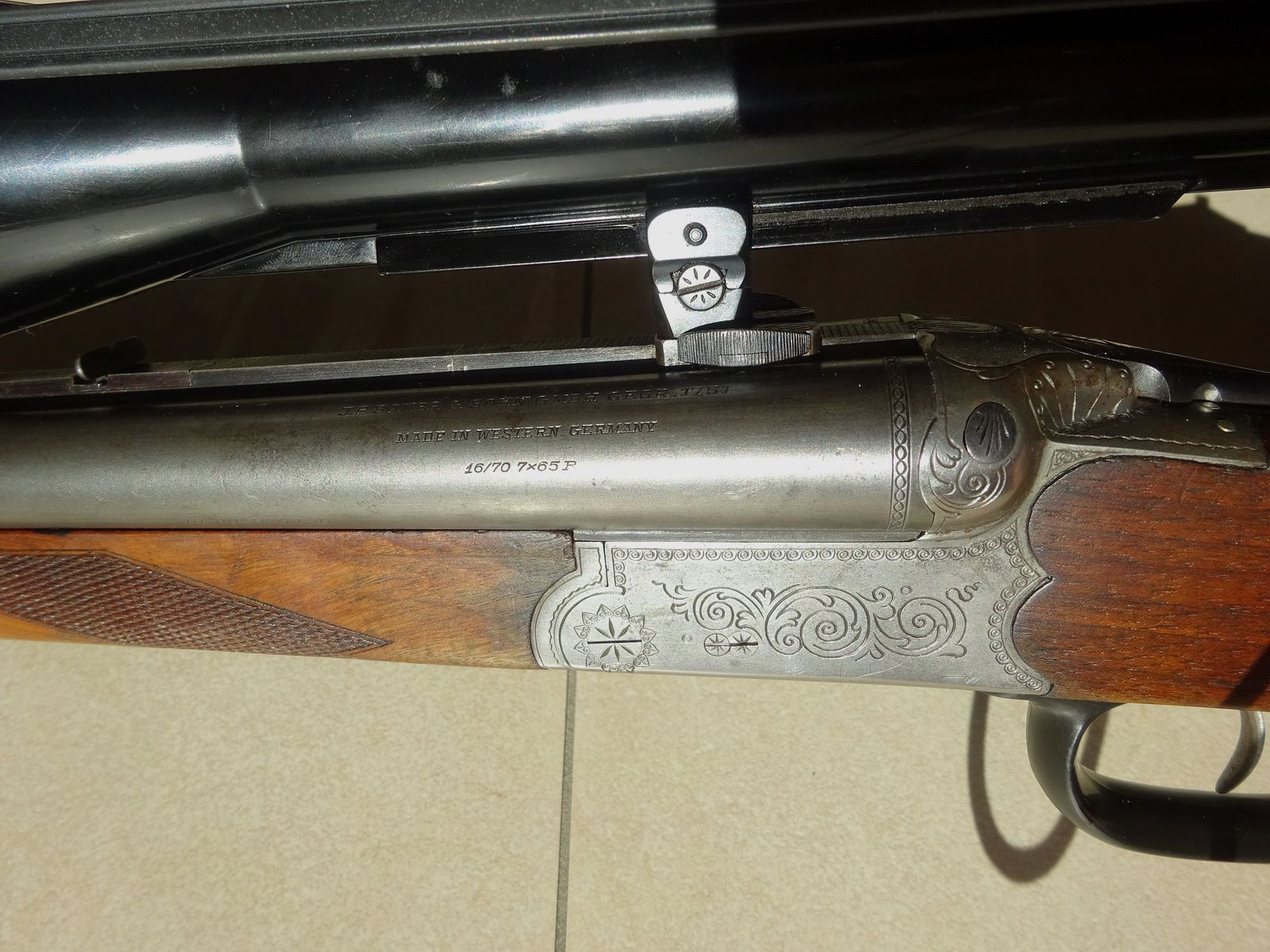 Elegante Einsteigerwaffe für Jungjäger sowie ideale Kombiwaffe für Feld/Waldreviere: Sauer & Sohn Modell 3000 Drilling Kal. 7x65R 16/70