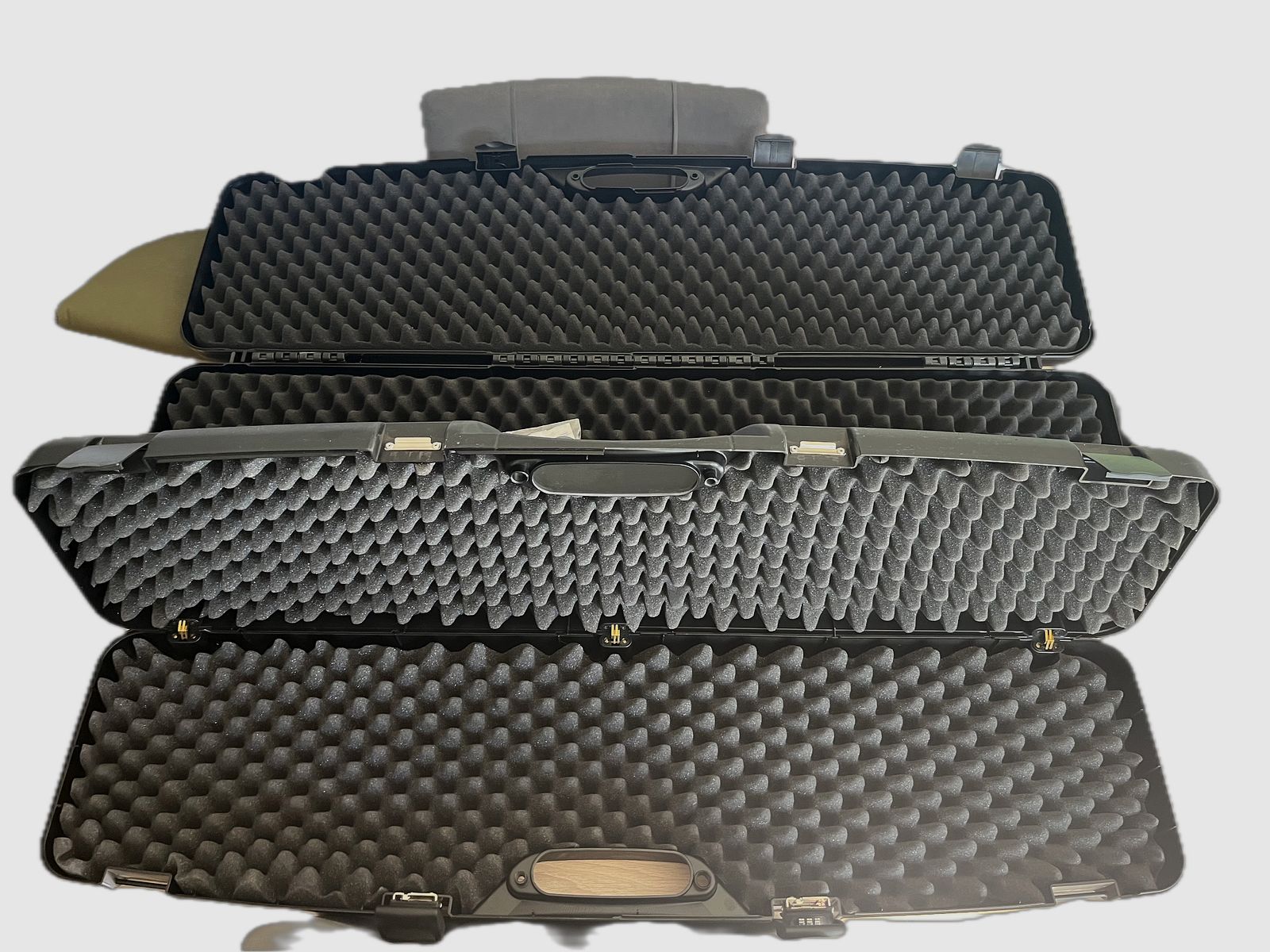 2 long gun cases, handgun cases and holsters