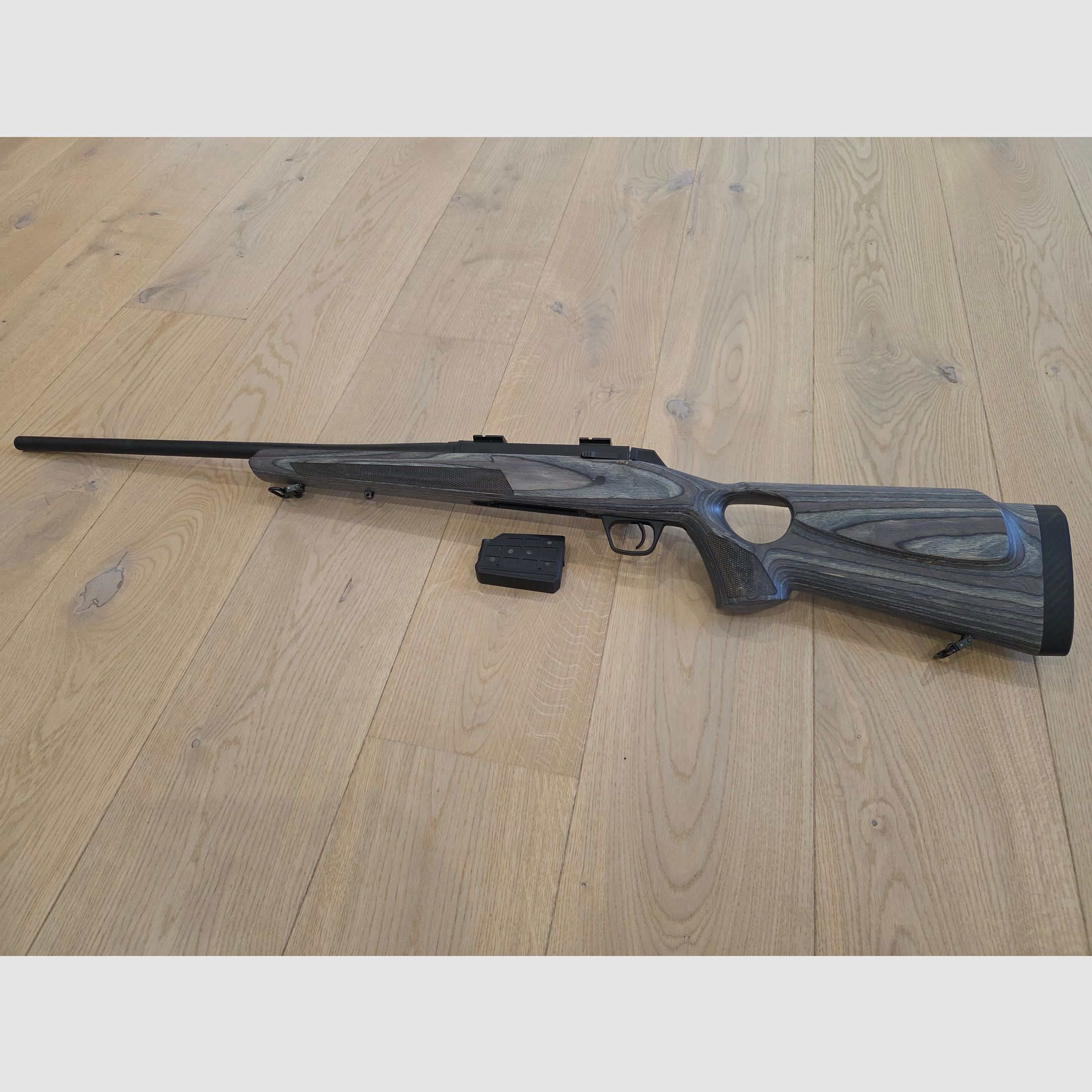 Winchester XPR repeating rifle in .308 with Steiner Ranger scope and silencer