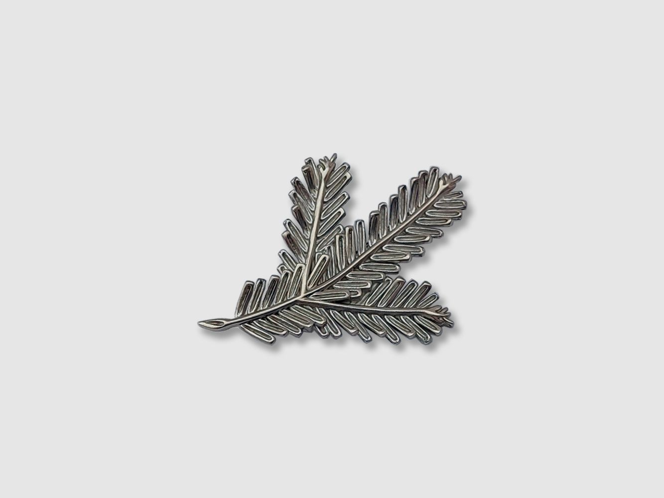 The break of silver: a hunting badge for the hat