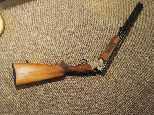 Fusil à deux coups Conquest, calibre 12, d'occasion mais en bon état !