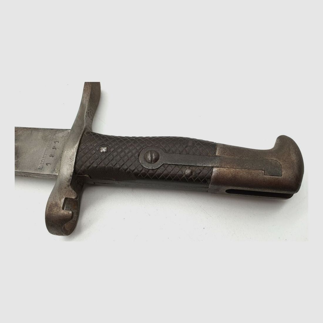 Vetterli original Vetterli bayonet with saw teeth and green fur on the scabbard