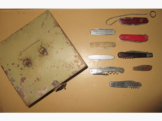 Swiss army knife, among other things, old metal box ammunition box