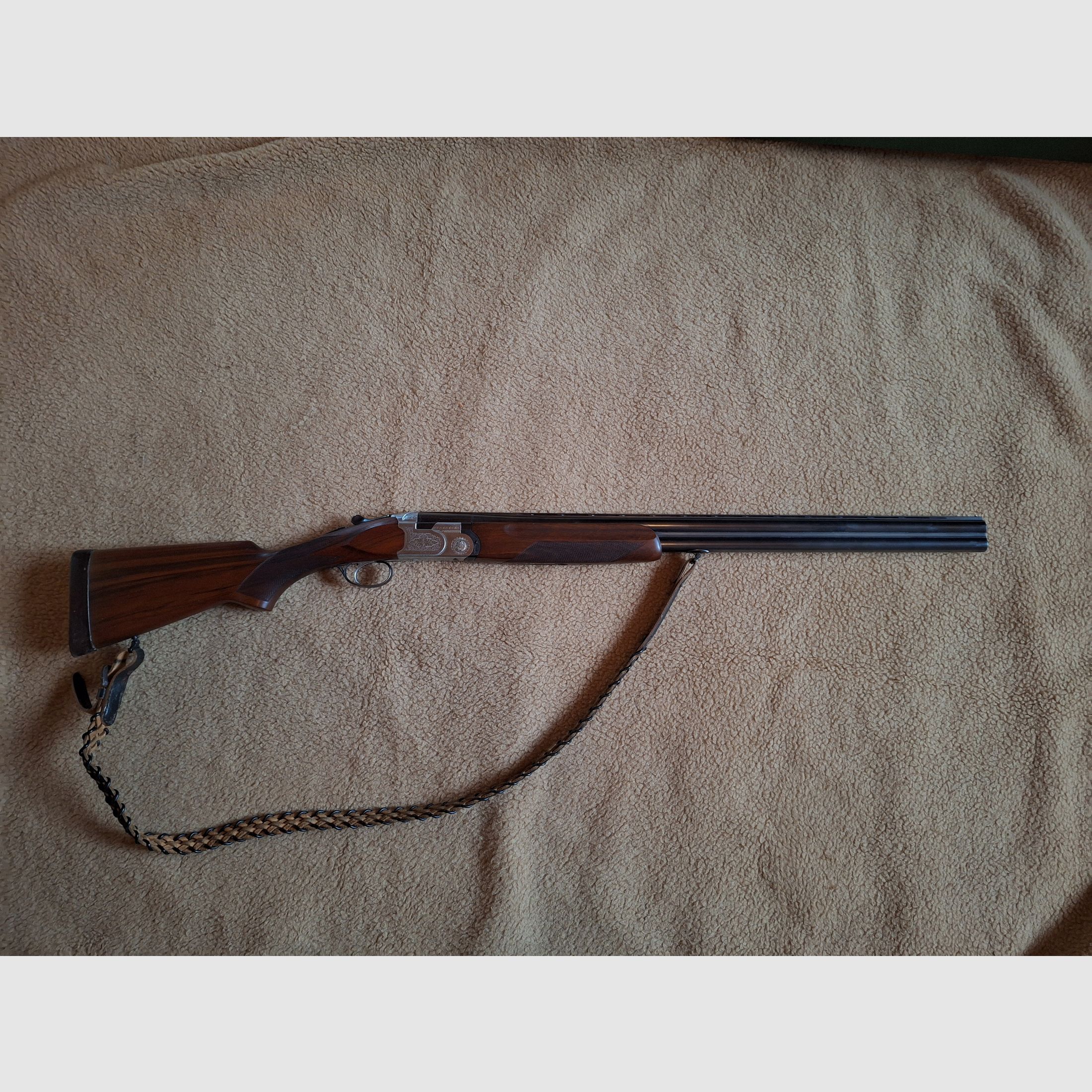 Escopeta de doble cañón superpuesta de Beretta, modelo B25, calibre 12/70