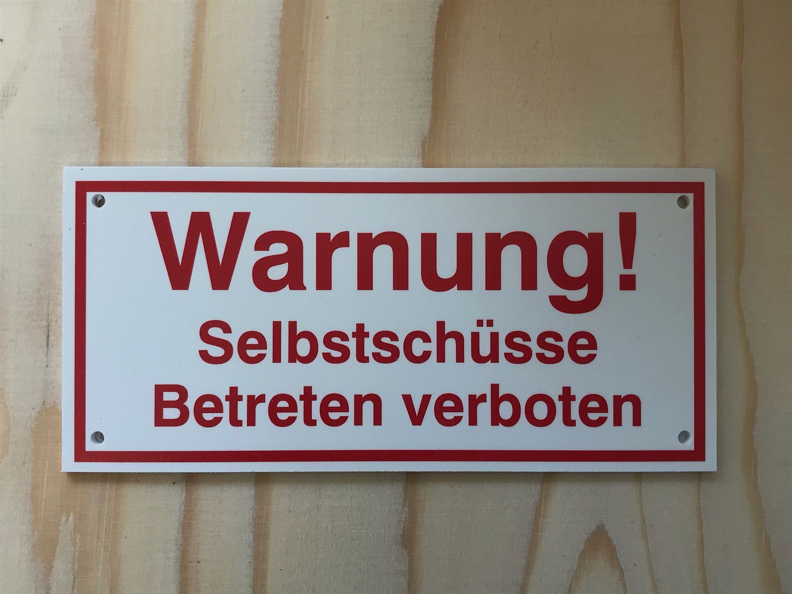 Warnschild Achtung Selbstschüsse