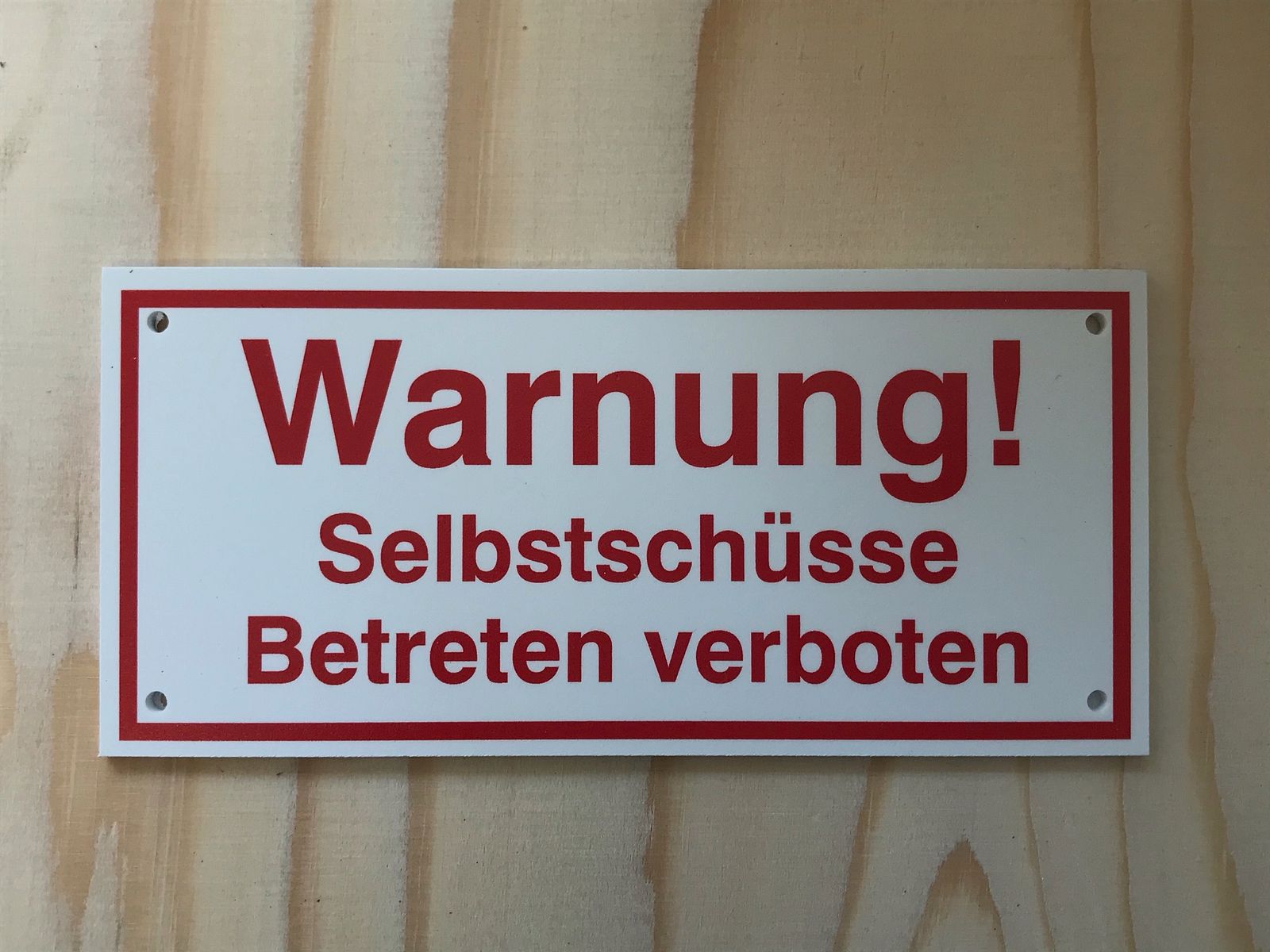 Warnschild Achtung Selbstschüsse