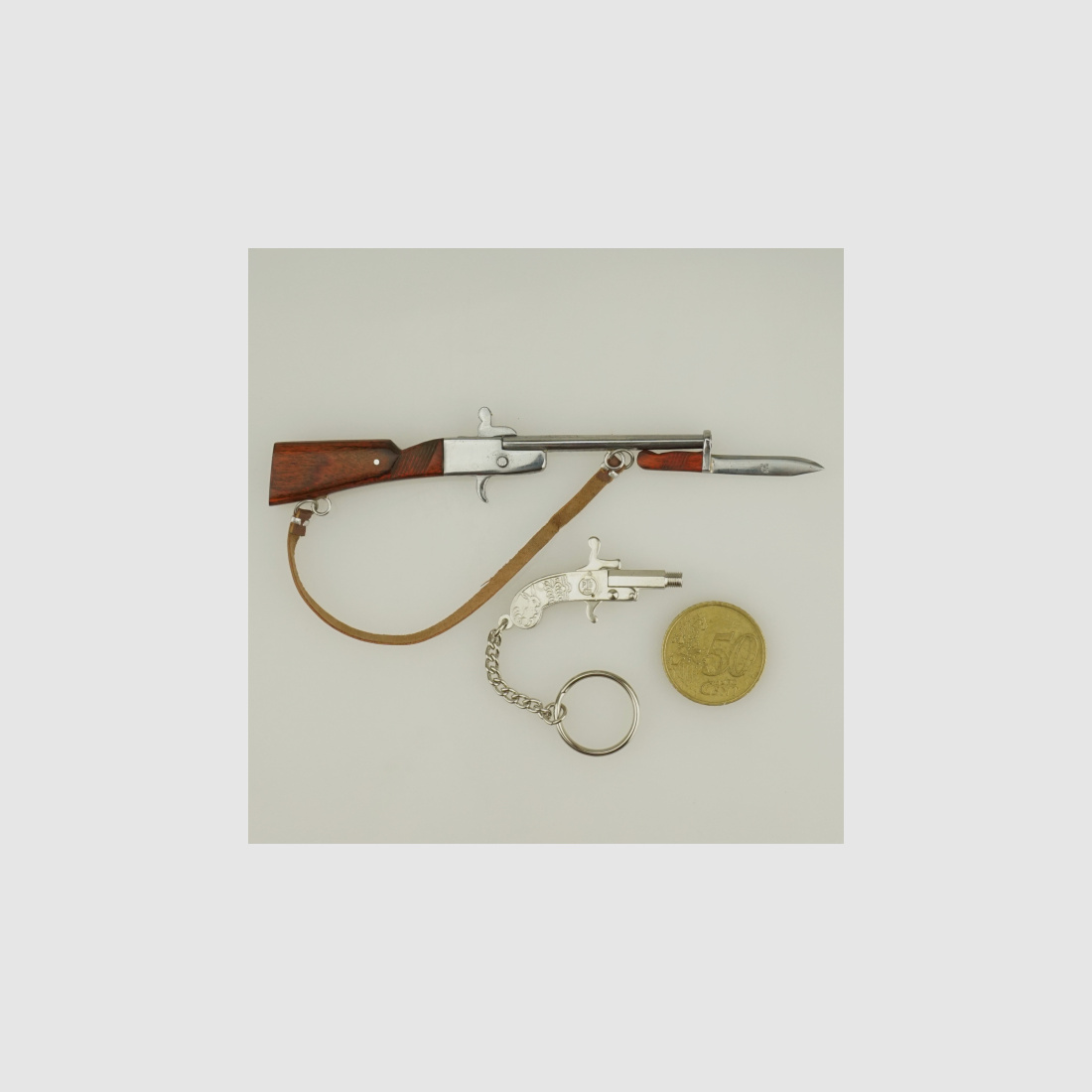 1x Gewehr und 1x Berloque 2mm Pistole wie xythos berloque 2 mm. Pinfire Gun Knallkapseln