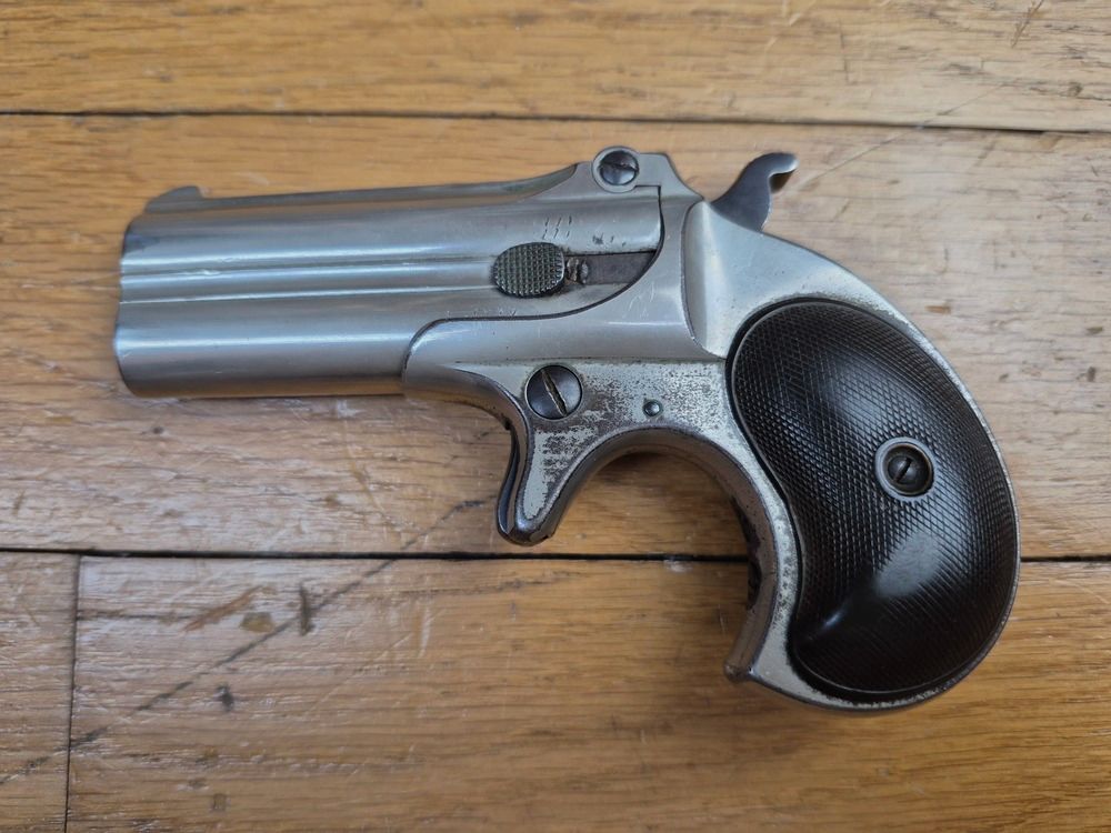 Ikonische Doppel-Pistole Derringer Remington M95 – Kal. 41RF – Typ II – Nickel-Finish – Ausgezeichneter mechanischer Zustand – Sehr schöne Läufe – Perfekte Auswurf – Griffschalen aus Ebonit in sehr gutem Zustand – 80.000 Exemplare – Gürtelholster! – Ein „Joker“ im Ärmel eines As in ausgezeichnetem Zustand – TBE++, Bild 2 von 22
