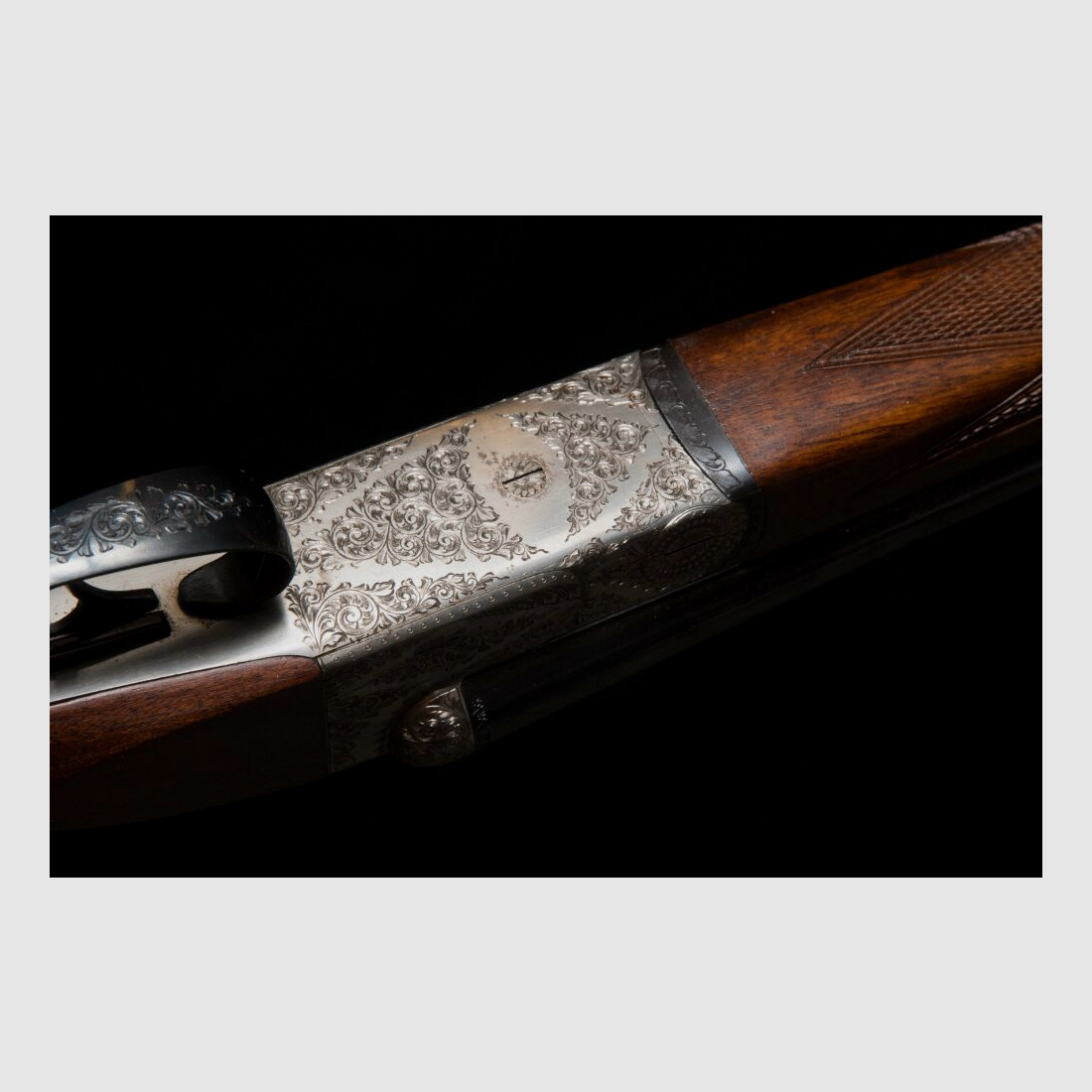 elegante Doppelflinte mit umfassender Gravur