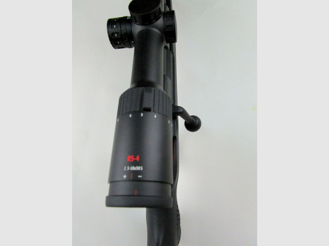 Mauser 25 Extreme with scope and silencer