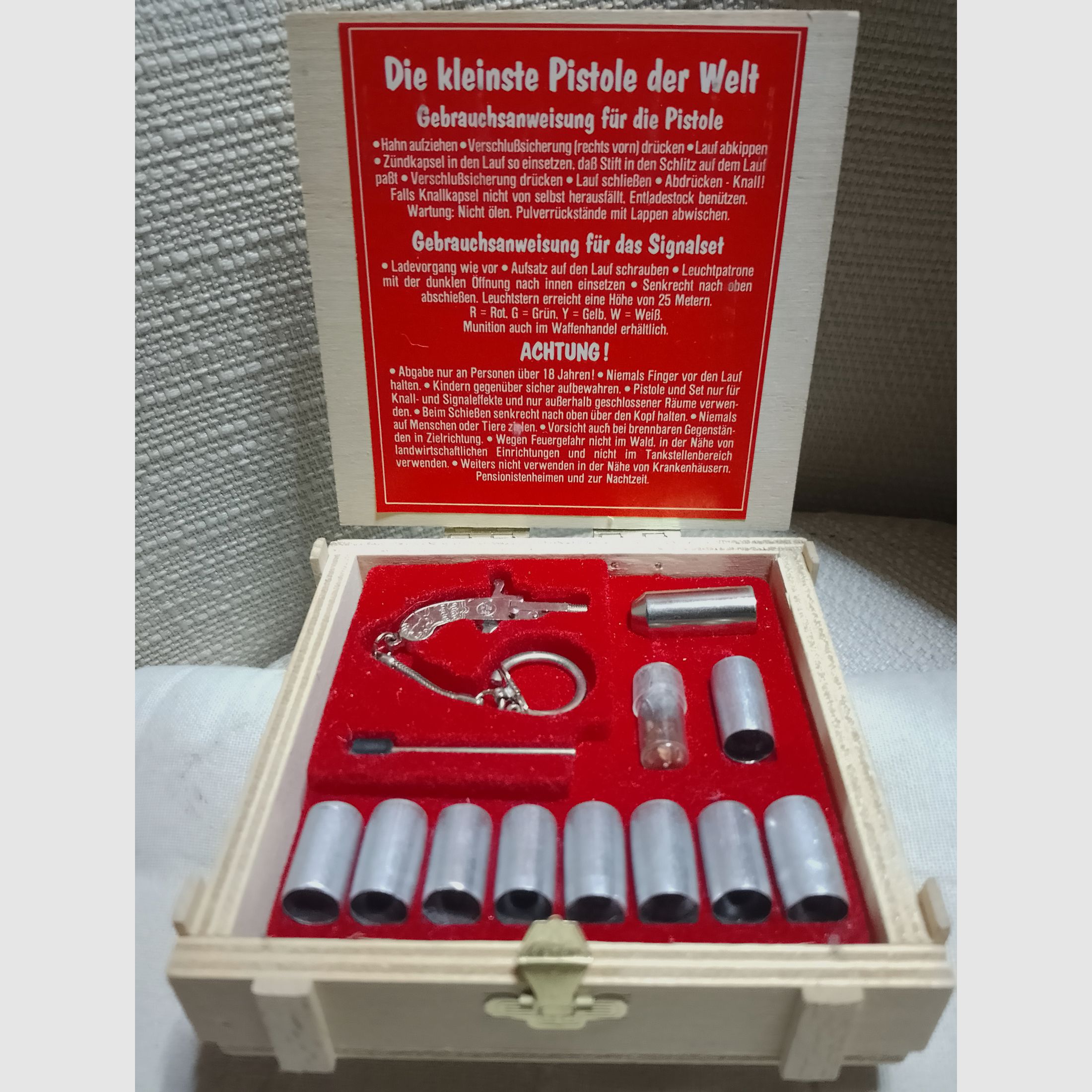 Nice collector box wooden case smallest pistol in the world 2mm set small signal pistol big bang Berloque like new