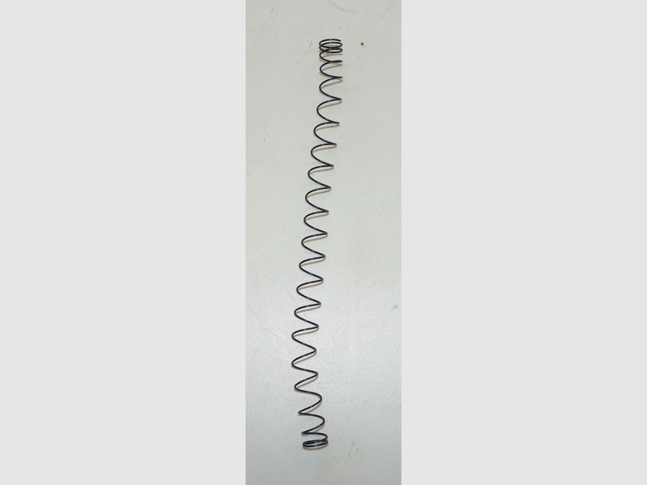 Fabbrica d'armi di Berna Gebr. Molla del caricatore, rotonda per pistola d'ordinanza svizzera Parabellum 1900, 1906, 1929 cal. 7,65mmPara P08