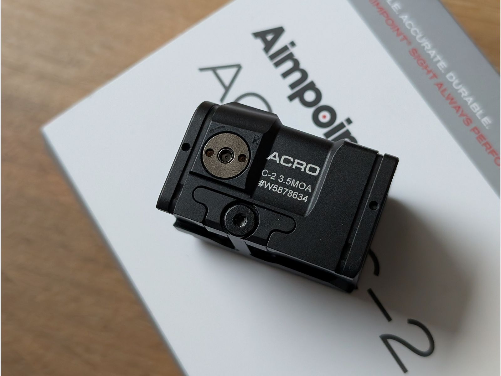 Two months old Aimpoint ACRO C-2 with receipt