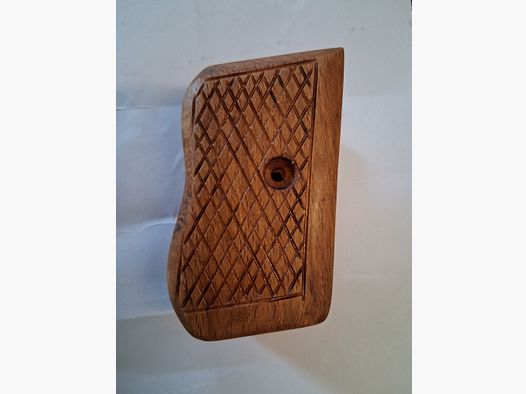 Wooden grip panel for old Mauser pistol