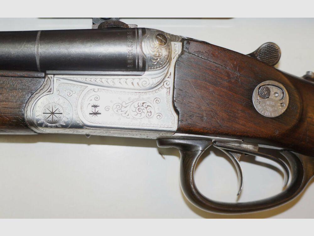 Krieghoff Drilling, Krieghoff, Kal.7x57R / Kal.16/70, mit GECO Zielfernrohr und schönen Gravuren