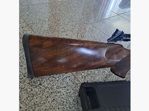 Sauer 404 like new con muchos extras