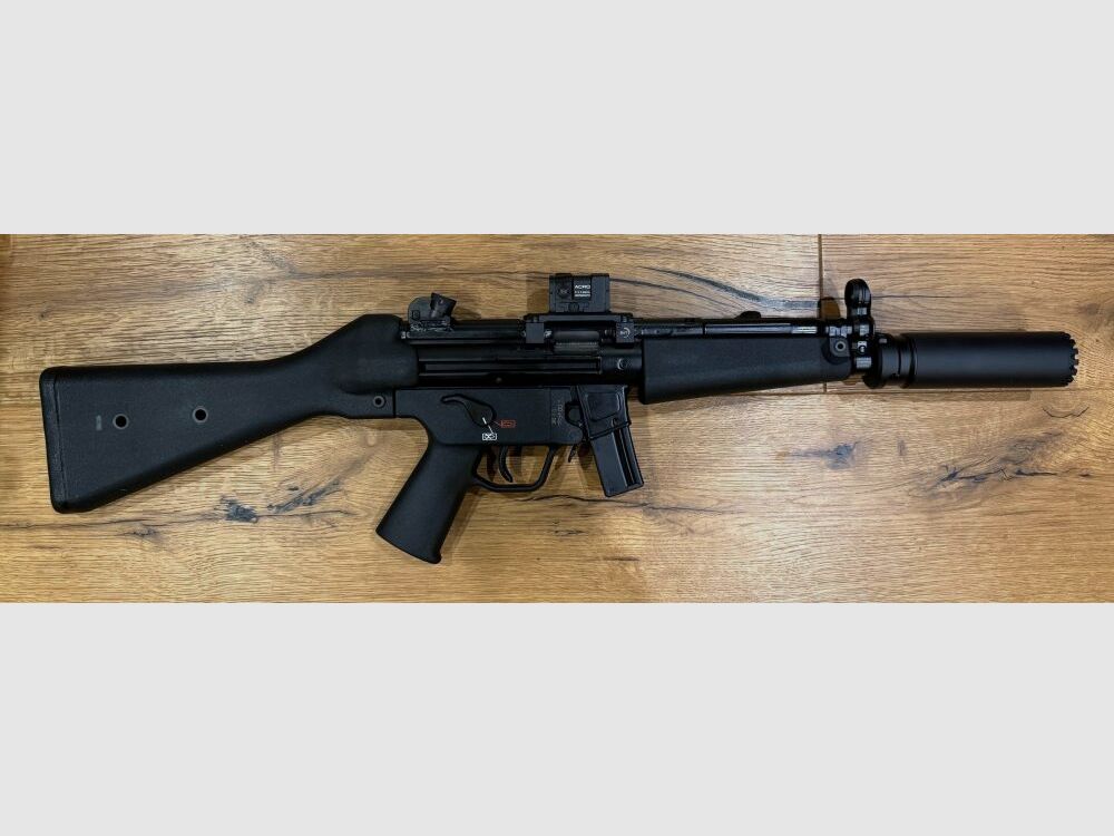 Karabin Heckler und Koch SP5 z tłumikiem B&T RBS Schalldämpfer SQD™ Compact i celownikiem Aimpoint ACRO