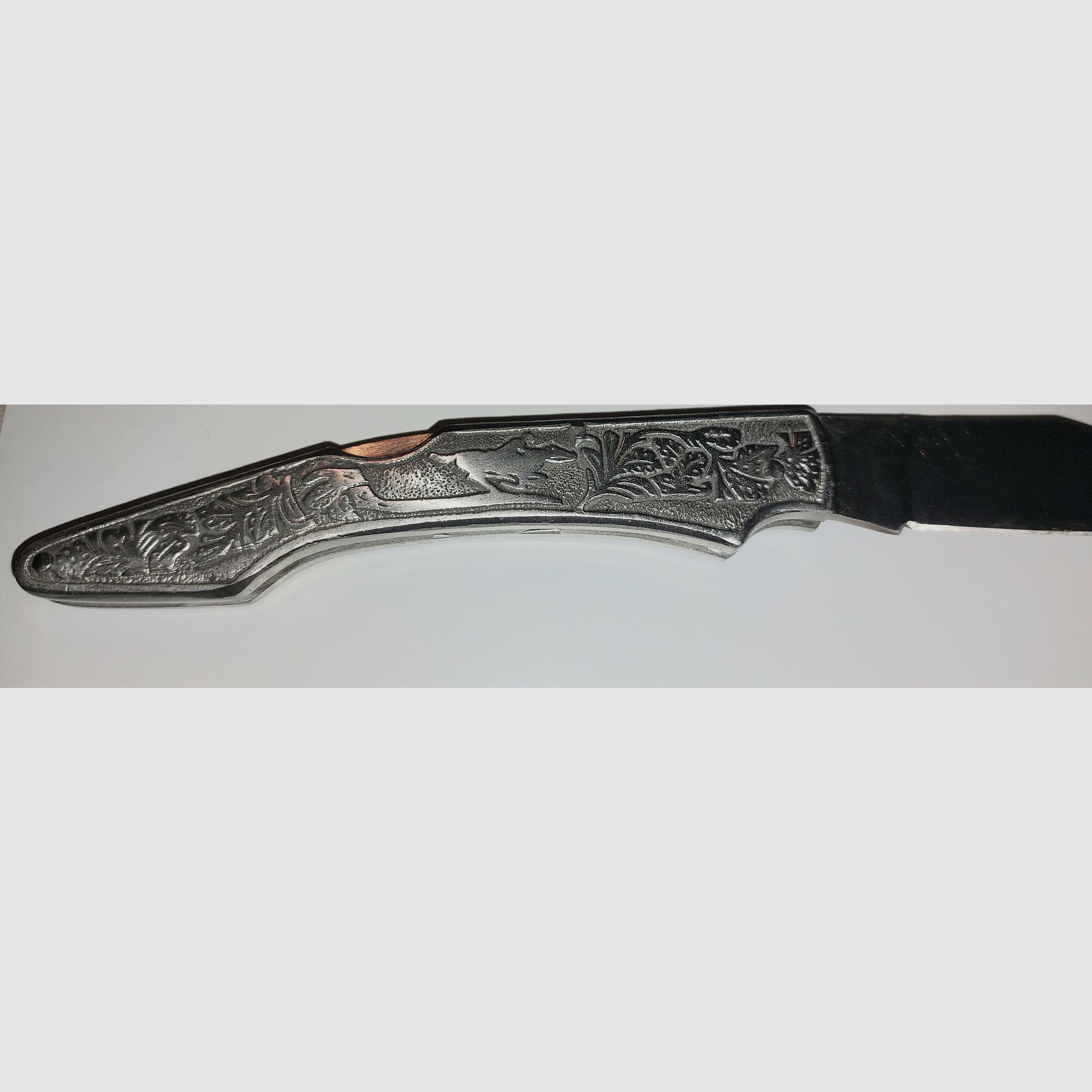 Pocket knife with rider motif, price negotiable