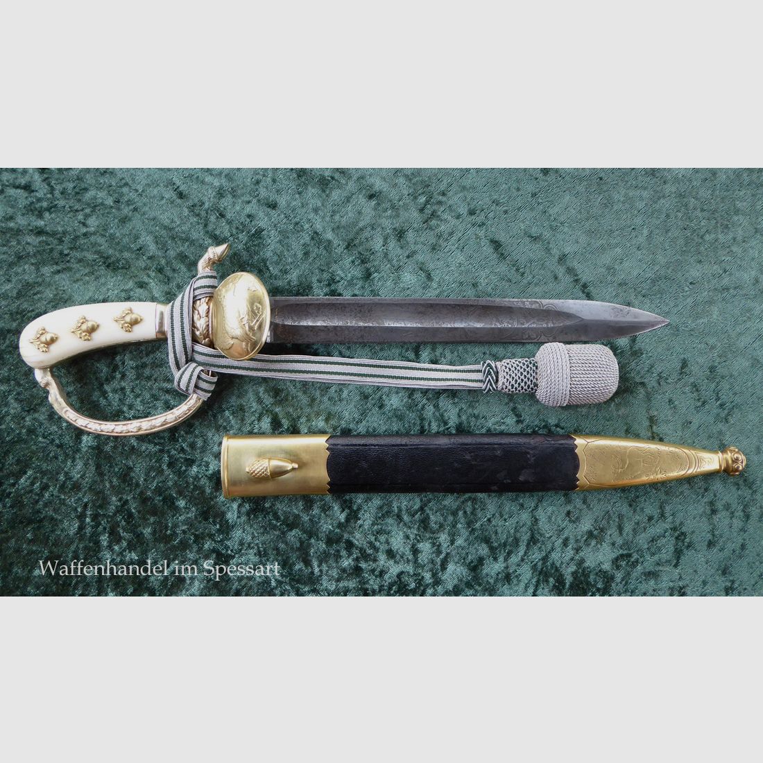 Stag knife with a guard vessel in ornate design from the time of World War II.