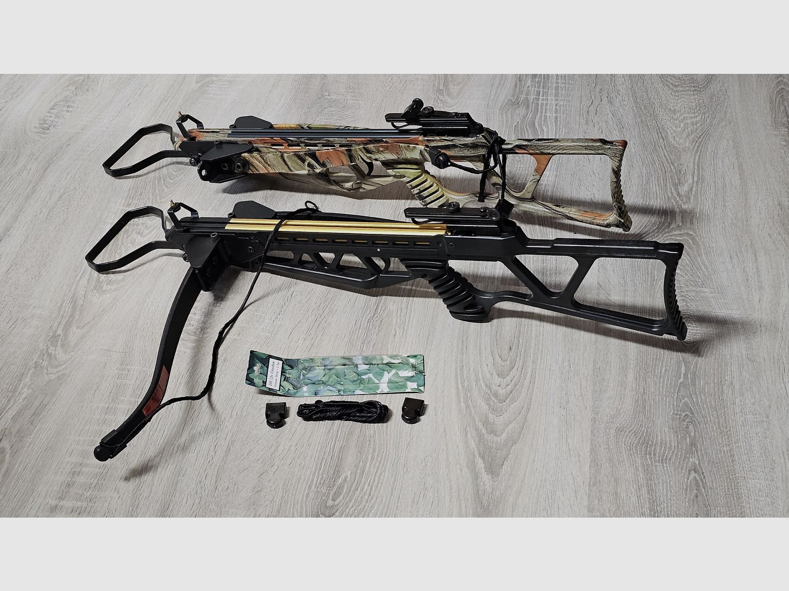Recurve crossbow double set: 2x Skeleton Hunter 120 lbs (Camo & Black) foldable, 45 bolts, spare string