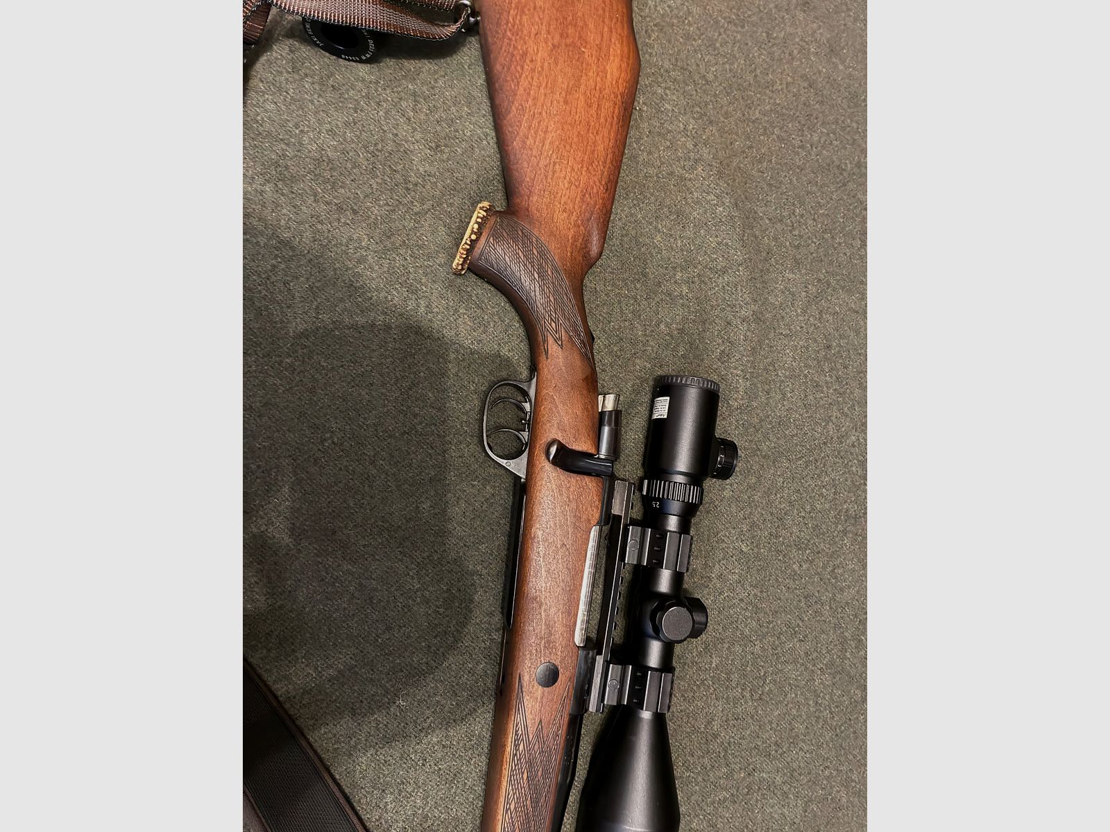 Voere repeater 7x64 with silencer and scope