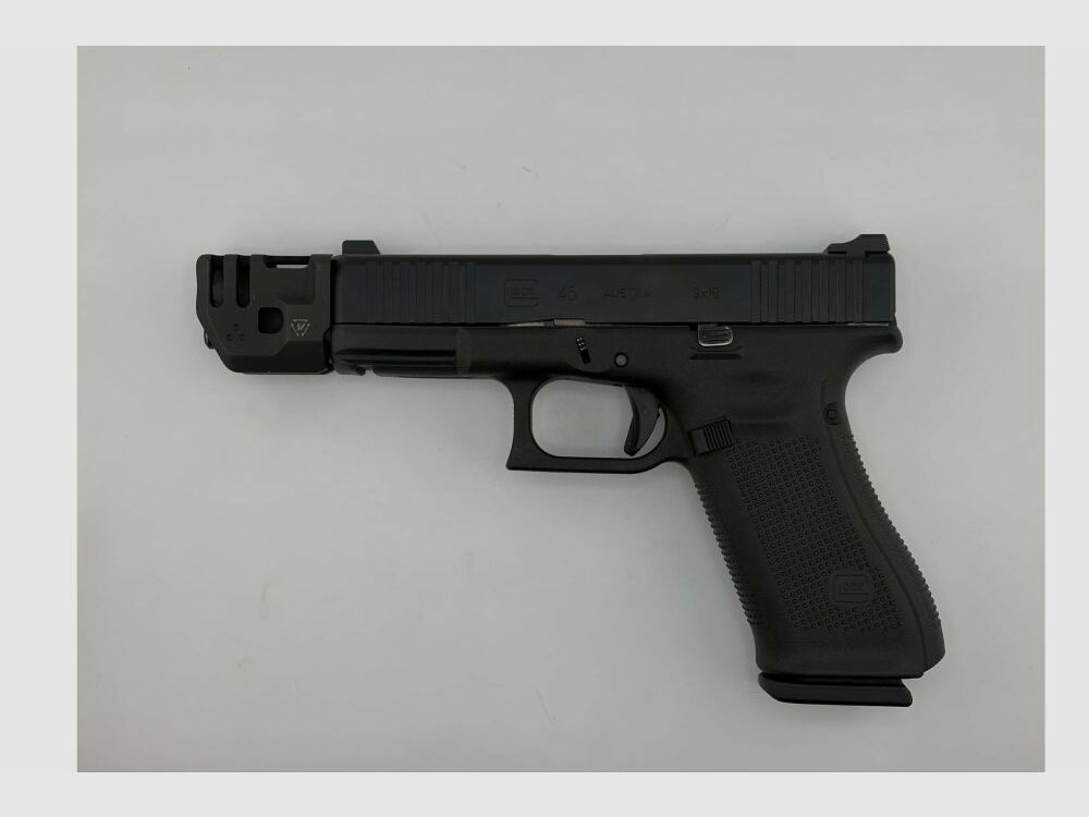 Glock 45 in 9x19 with removable Massdriver compensator from Strike Industries