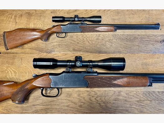 Voere over-and-under rifle with manual cocking and scope