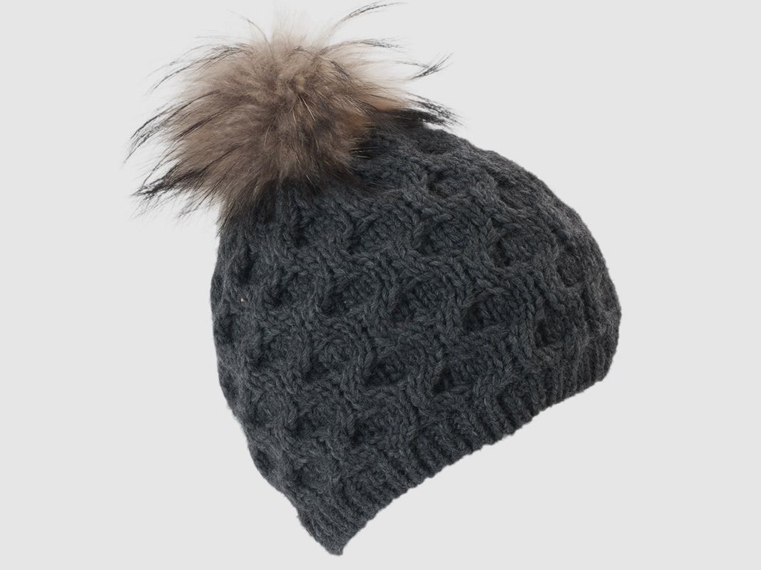 Cappello lavorato a maglia con pompon in pelliccia vera e motivo a nido d'ape