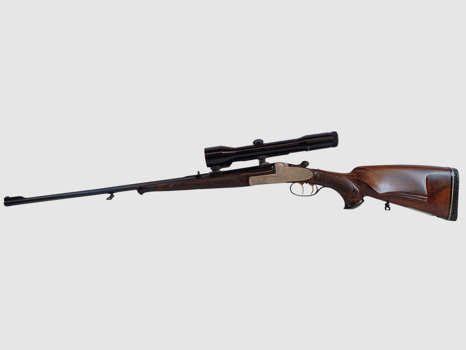Outschar Ferlach side lock break-action rifle in caliber 6.5x57R with variable Zeiss optics