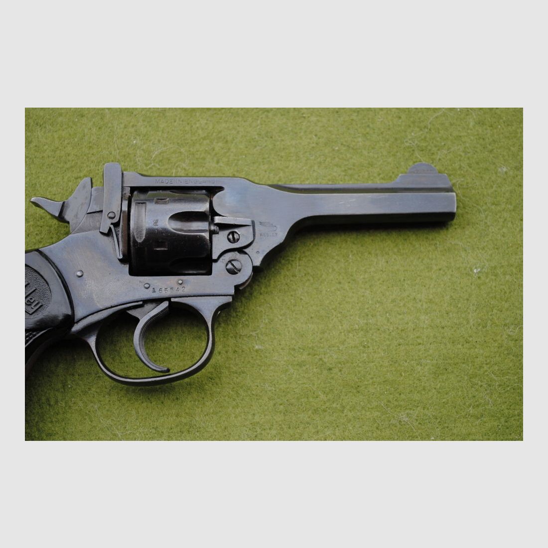 Webley MARK IV, various British stamps