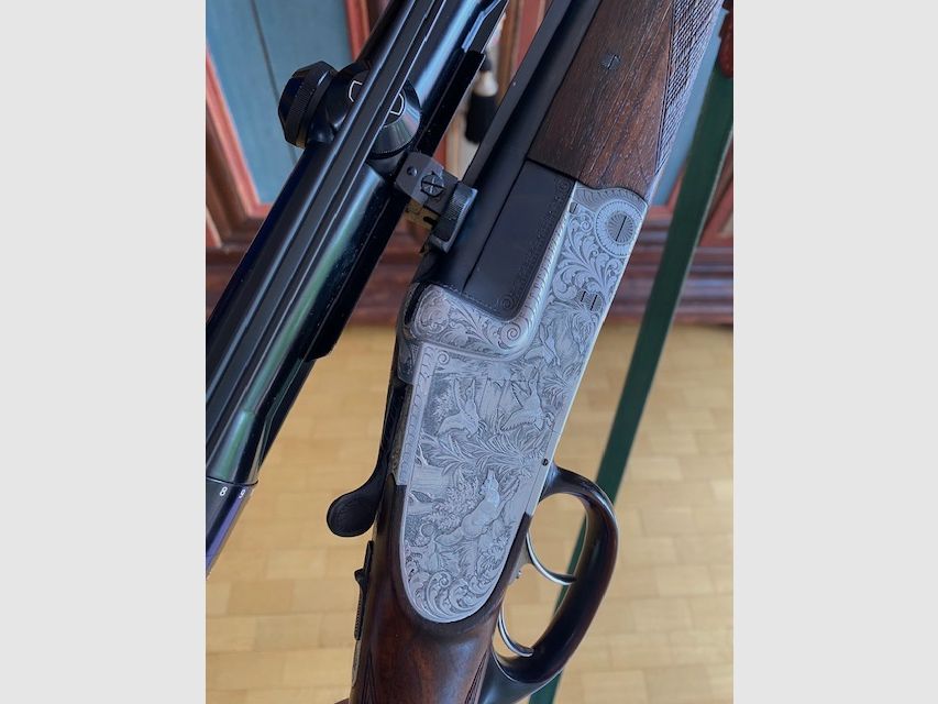 Krieghoff Ulm modèle Ulm à platine latérale Holland & Holland fusil à deux coups avec canon interchangeable 6,5x57R 20/76 Magnum 16/70 16/70 dans la mallette en excellent état BBF BDF