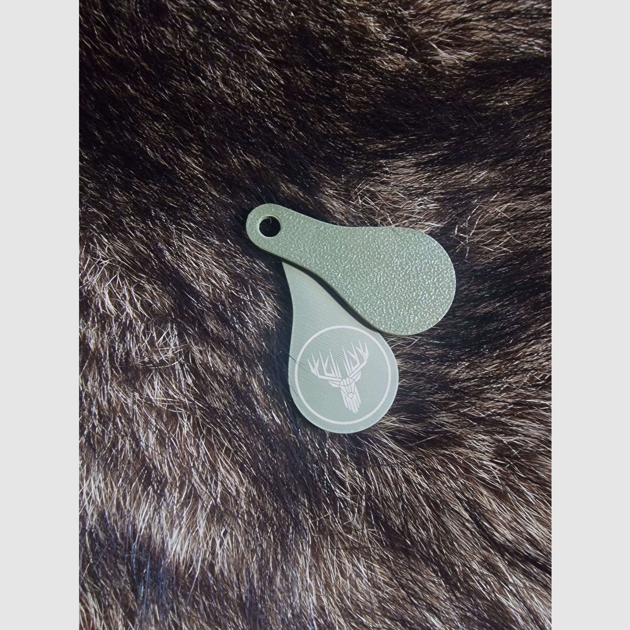 Einkaufswagenöffner mit jagdlichen Motiven