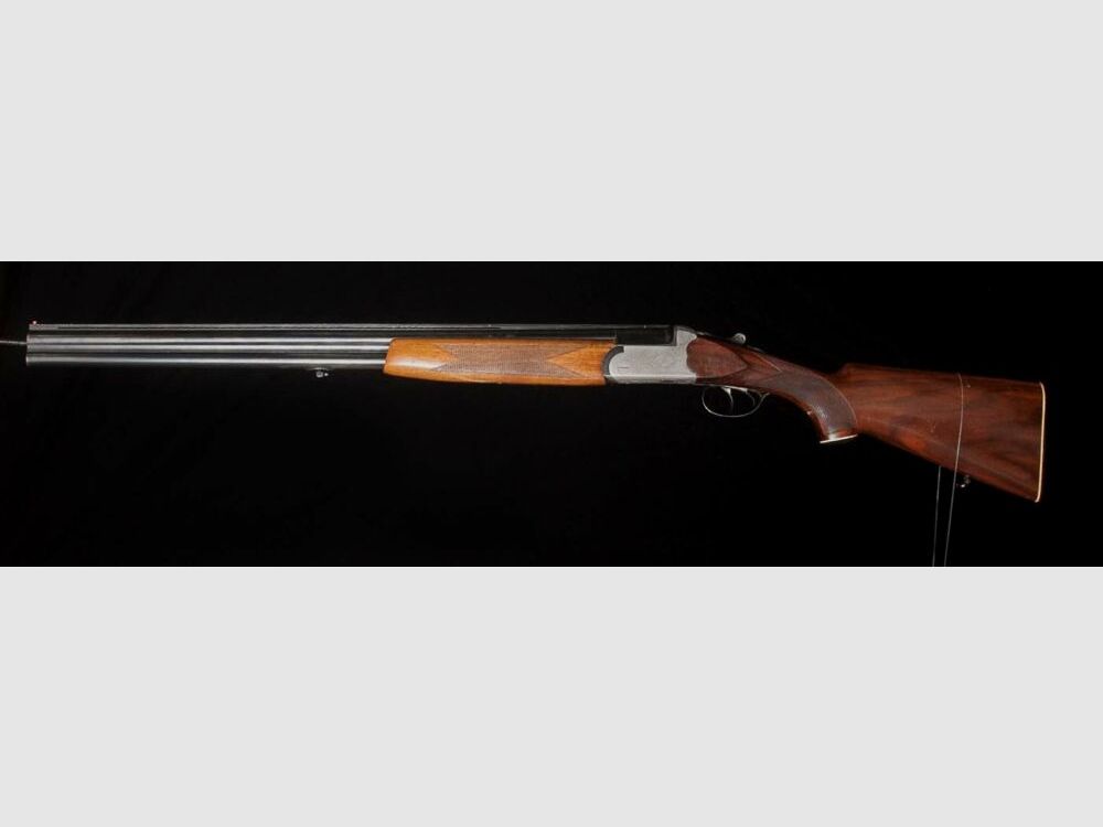 Double-barreled shotgun with ejector