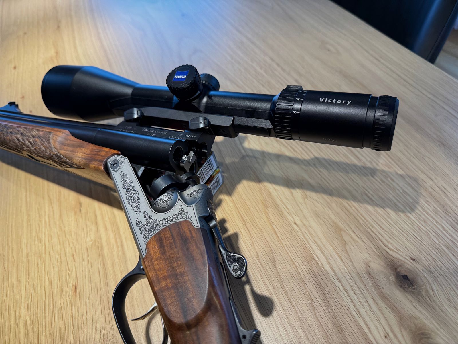 Blaser D99 dubbelbuksdrilling 9,3x74 / 9,3x74 / 20/76 met 2 x ZF Zeiss voor het zitten en drijfjacht, BESTE STAAT
