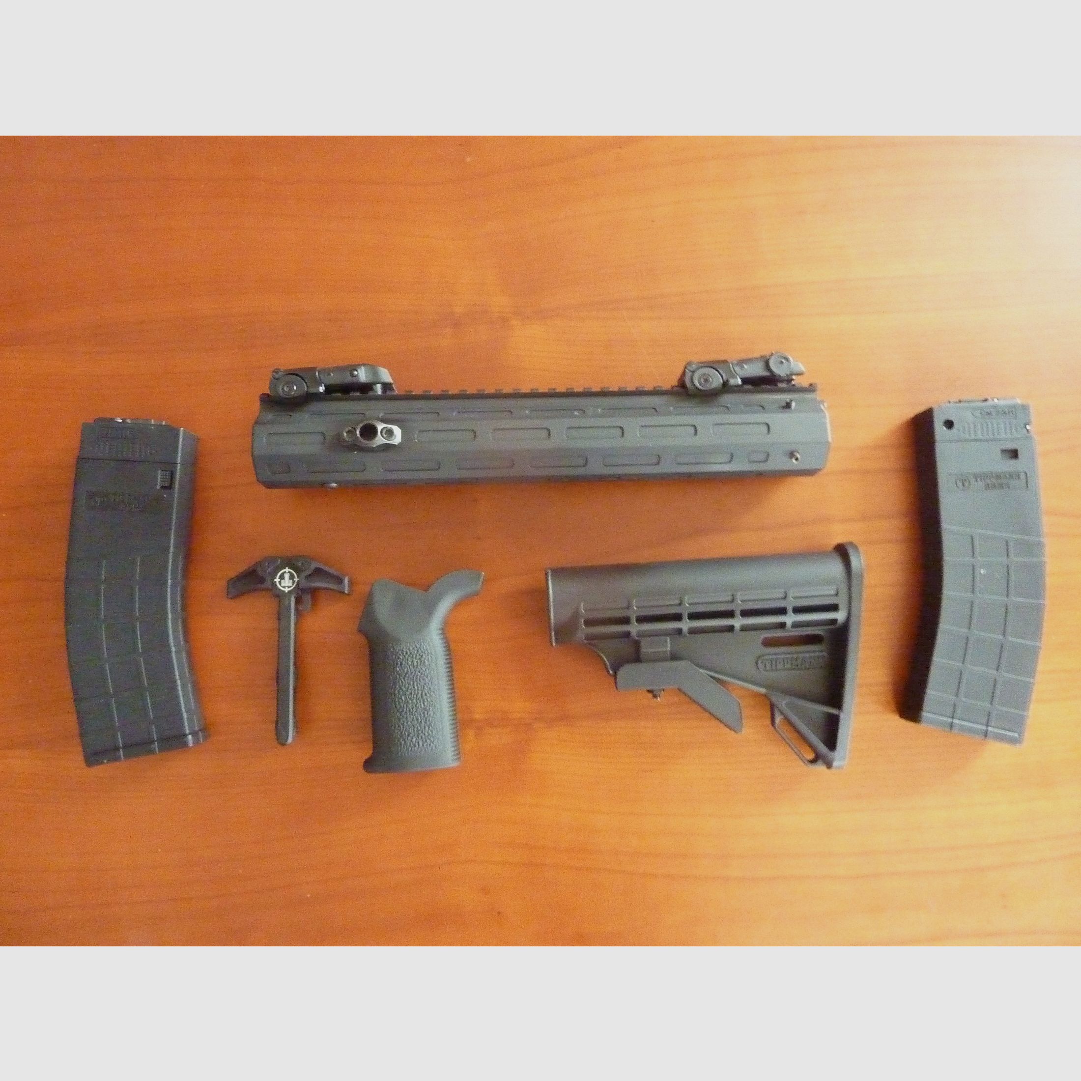 Tippmann Arms M4-22 handguard 12", charging handle and two 25 round magazines